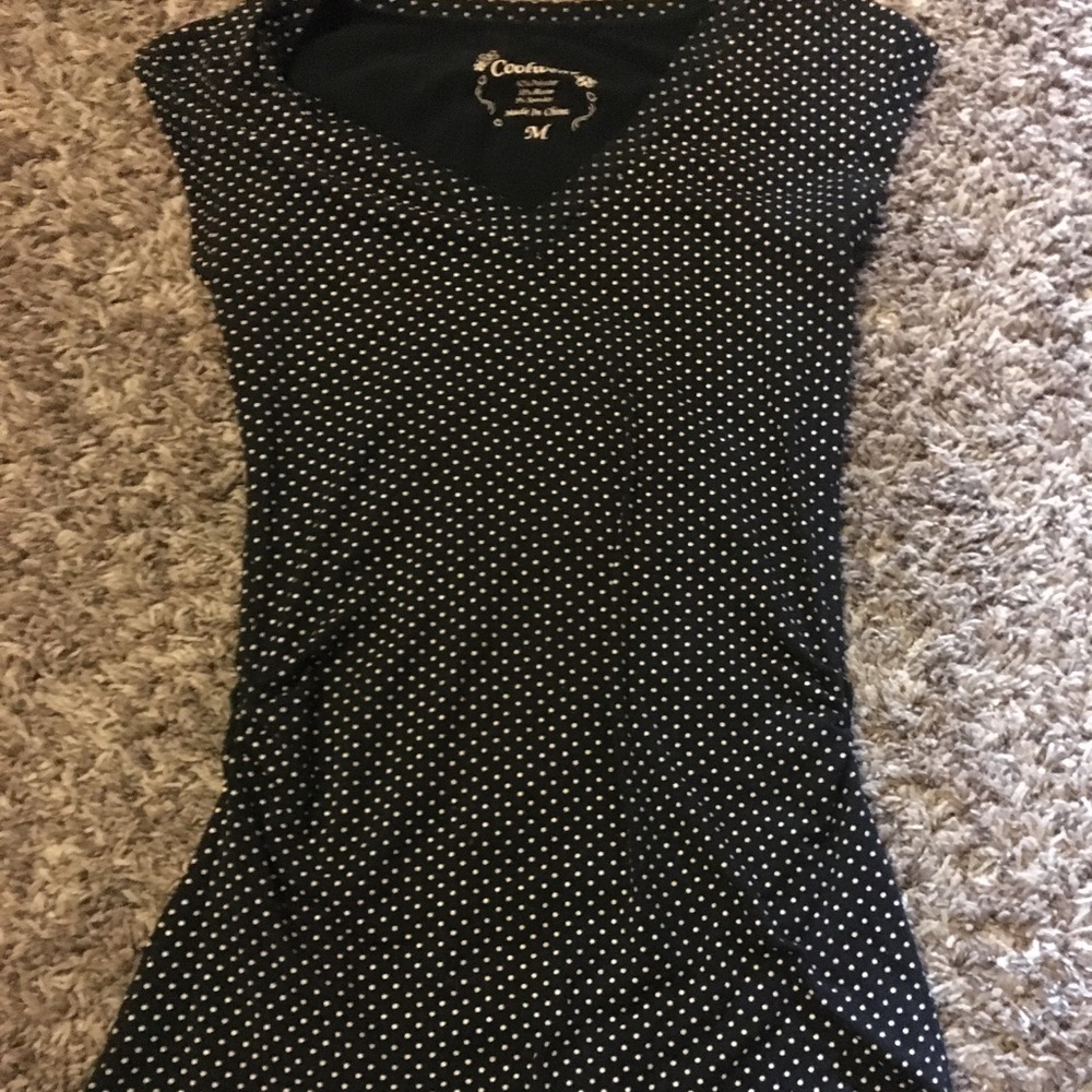 Black with white polka dots v cut shirt